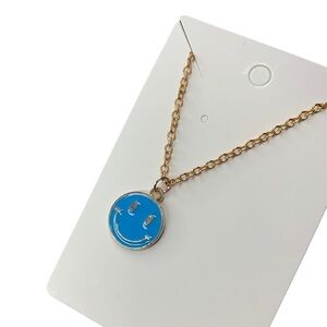 Blue and gold smiley face necklace